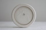 Ceramic large bowl in white with curved line pattern