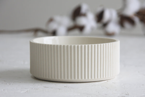 Ceramic small bowl in white with curved line pattern