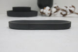 Modern ceramic black oval bowl in black curved line pattern