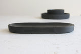 Modern ceramic black oval bowl in black curved line pattern