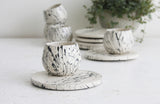 Eve - Ceramic espresso cup and saucer in white and black lines pattern