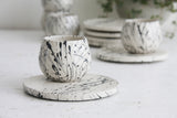 Eve - Ceramic espresso cup and saucer in white and black lines pattern