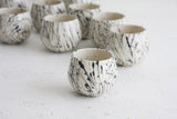 Eve - Ceramic espresso cup and saucer in white and black lines pattern