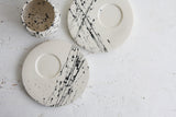 Eve - Ceramic espresso cup and saucer in white and black lines pattern