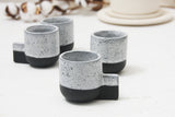 Lenny- Ceramic espresso cup in black with white glaze and black dots pattern