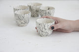 Lili - ceramic espresso cup in white and black lines pattern