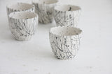 Lili - ceramic espresso cup in white and black lines pattern