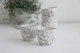 Lili - ceramic espresso cup in white and black lines pattern