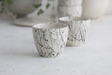 Lili - ceramic espresso cup in white and black lines pattern