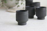 Modern ceramic espresso cup in black