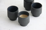 Modern ceramic espresso cup in black