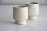 Modern ceramic espresso cup in white