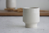 Modern ceramic espresso cup in white