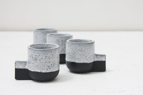 Lenny- Ceramic espresso cup in black with white glaze and black dots pattern