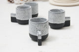 Lenny- Ceramic espresso cup in black with white glaze and black dots pattern