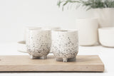 Plus- Ceramic espresso cup in white and black dots pattern