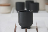 Plus- Ceramic espresso cup in black and glossy glaze