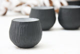 Eve - Hand-carved ceramic espresso cup in black and white glossy glaze- short